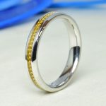 Karikagyűrű - 18 karátos Sárga arany lánc díszítéssel és élletöréssel