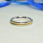 Karikagyűrű - 18 karátos Sárga arany lánc díszítéssel és élletöréssel