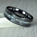 Black Ceramic Wedding Ring with Mother of Pearl center and Antimonite Crystal lines
