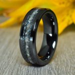 Black Ceramic Wedding Ring with Mother of Pearl center and Antimonite Crystal lines