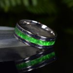 Titanium Wedding Ring with Green Emerald & Aurora Green Glow with Antimonite crystal sides